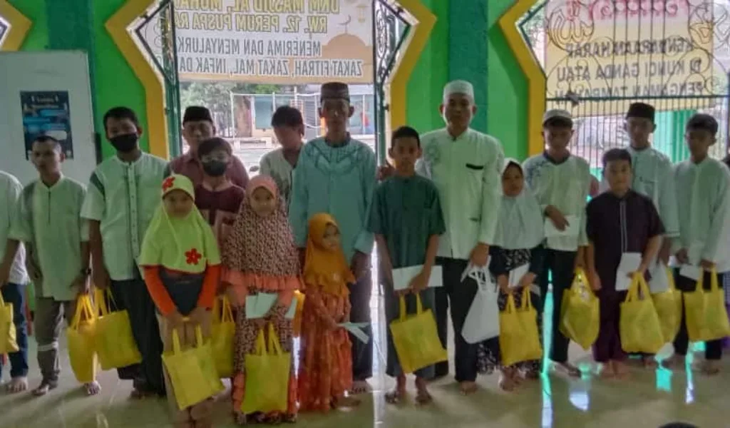 Berbagi Berkah di Bulan Ramadhan 1444 H Warga Perum TNI Puspa Raya