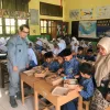 Kepala Bakamla RI Pimpin Makan Siang Bergizi Terhadap 2.500 siswa/i sekolah di seluruh Indonesia